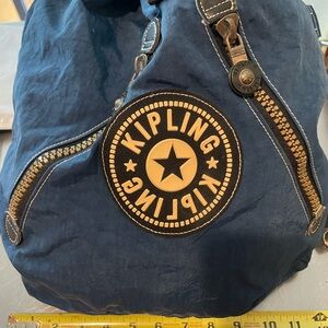 Kipling Vintage Denim Blue Backpack with Gold Accents
